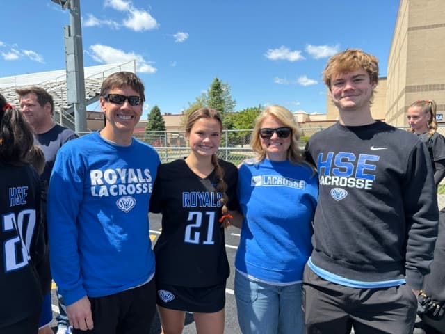 The Wright family in Royals and HSE lacrosse gear.