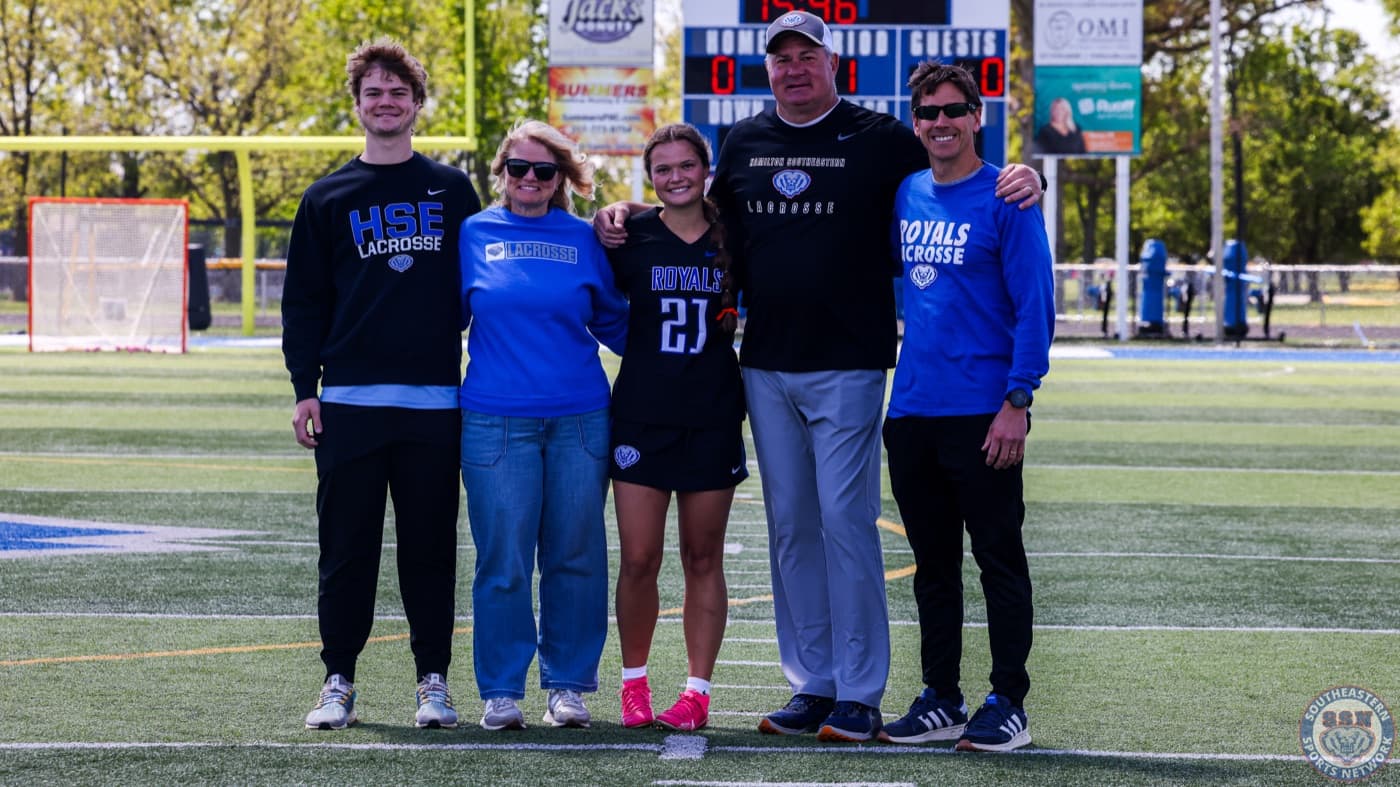The Wright family on the field for lacrosse senior night.